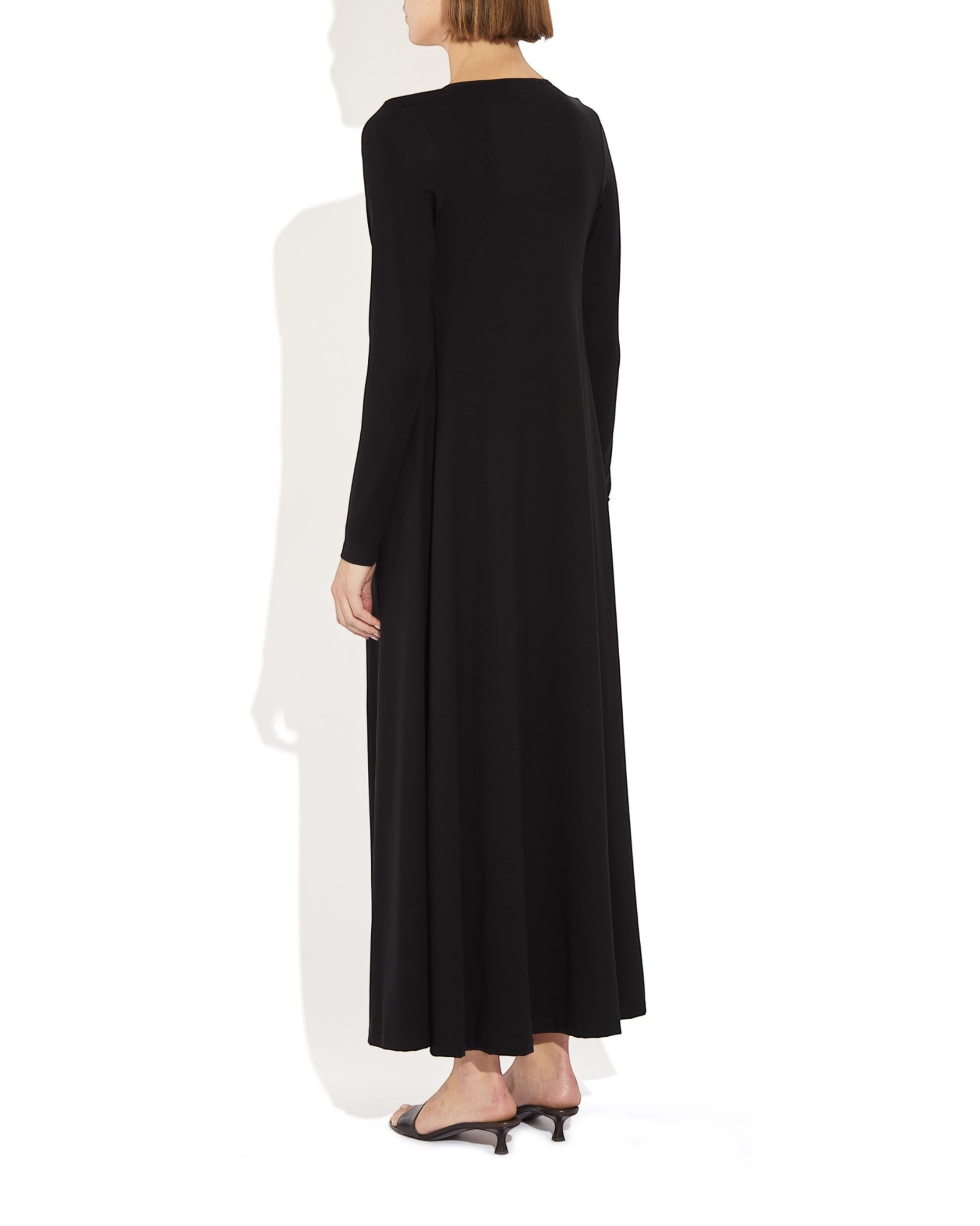 Weldun Julia long black fluid cardigan in soft stretch PYRATEX fabric, back view on a model