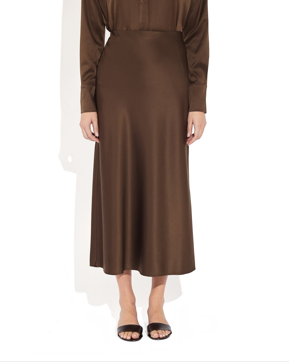 Weldun Max Skirt in dark brown stretch silk with a fluid bias-cut silhouette and comfortable elastic waistband.