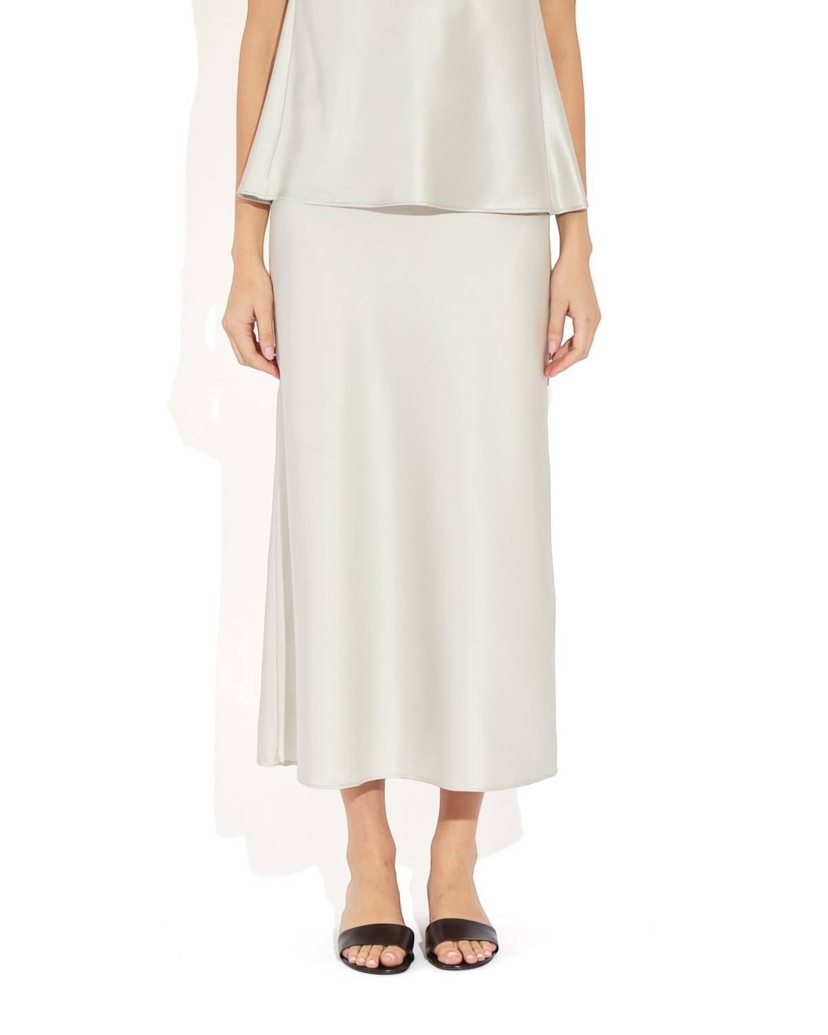 Weldun Max Skirt in light grey stretch silk with a fluid bias-cut drape and comfortable elastic waistband