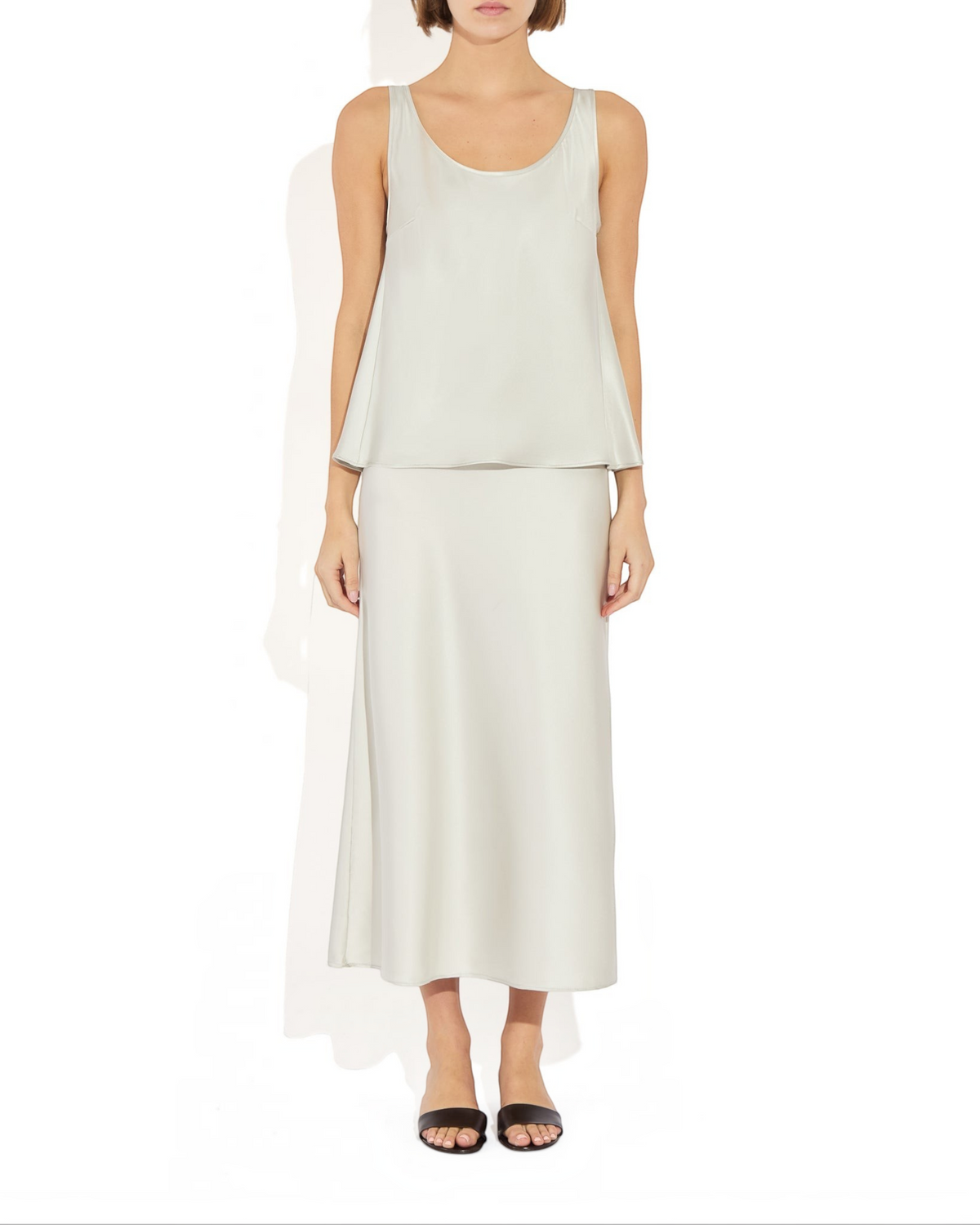 Weldun Max Skirt in light grey stretch silk with an elastic waistband, worn by a model for a fluid, elegant drape.