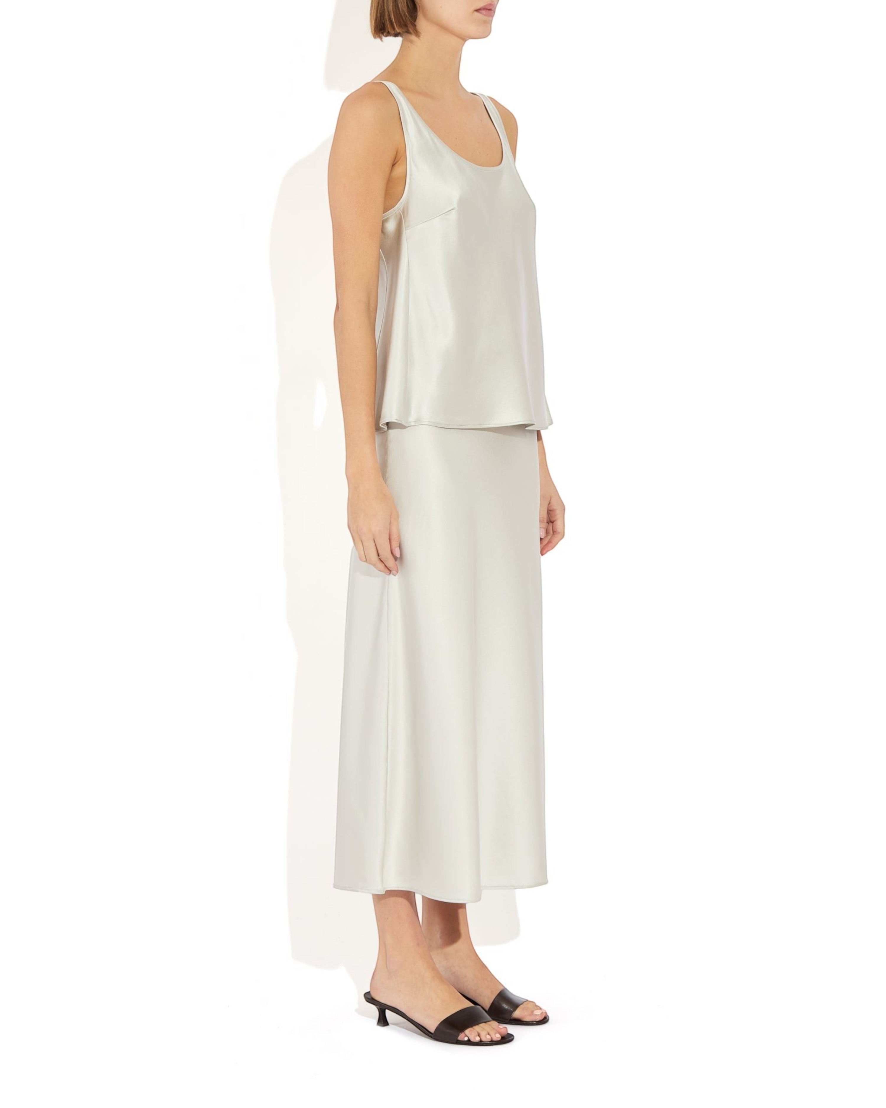 Weldun Max Skirt in silver stretch silk with a fluid bias-cut silhouette and comfortable elastic waistband