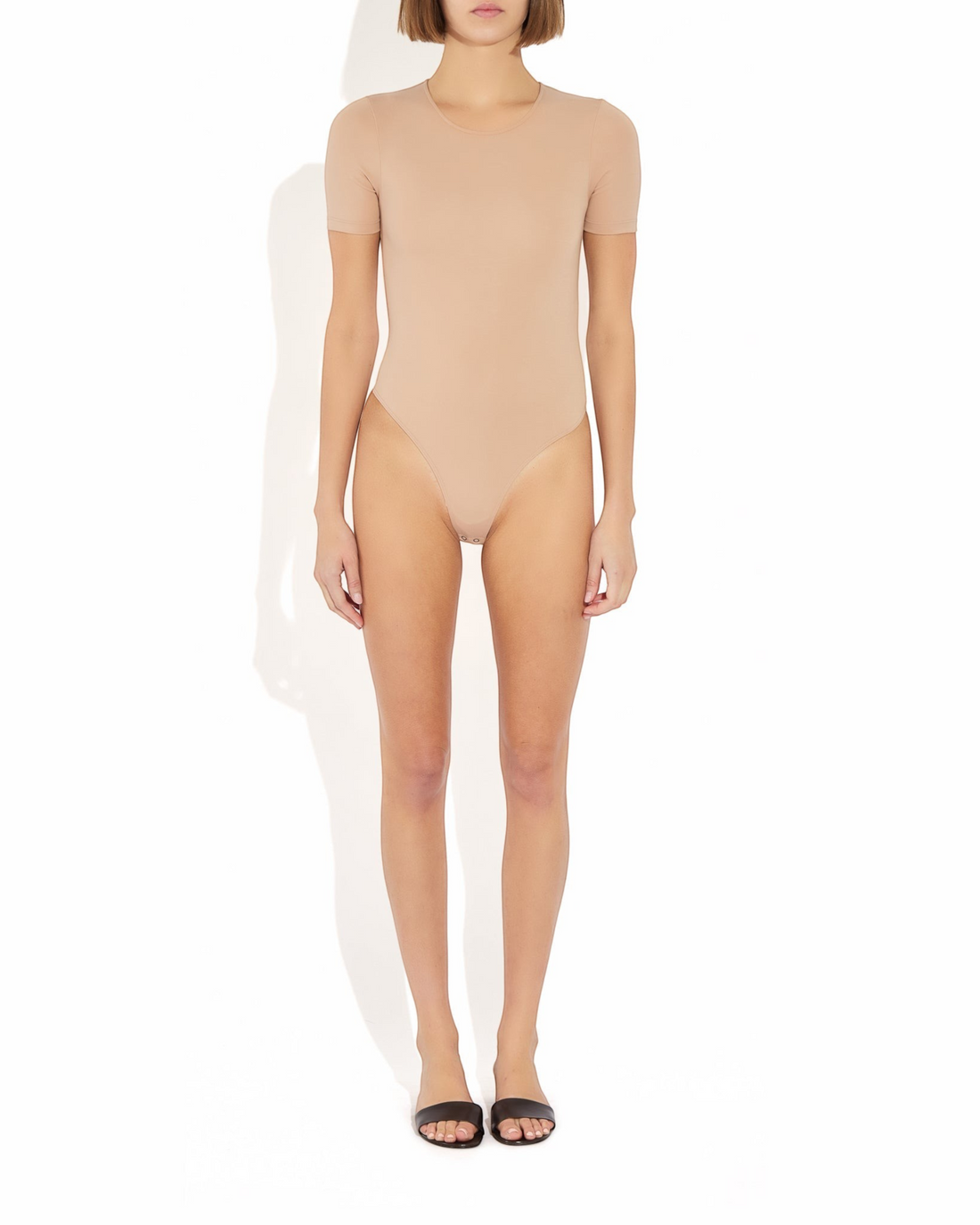 Weldun Penny Bodysuit in nude beige featuring a ballerina neckline, short sleeves, and a smooth, stretchy fit.