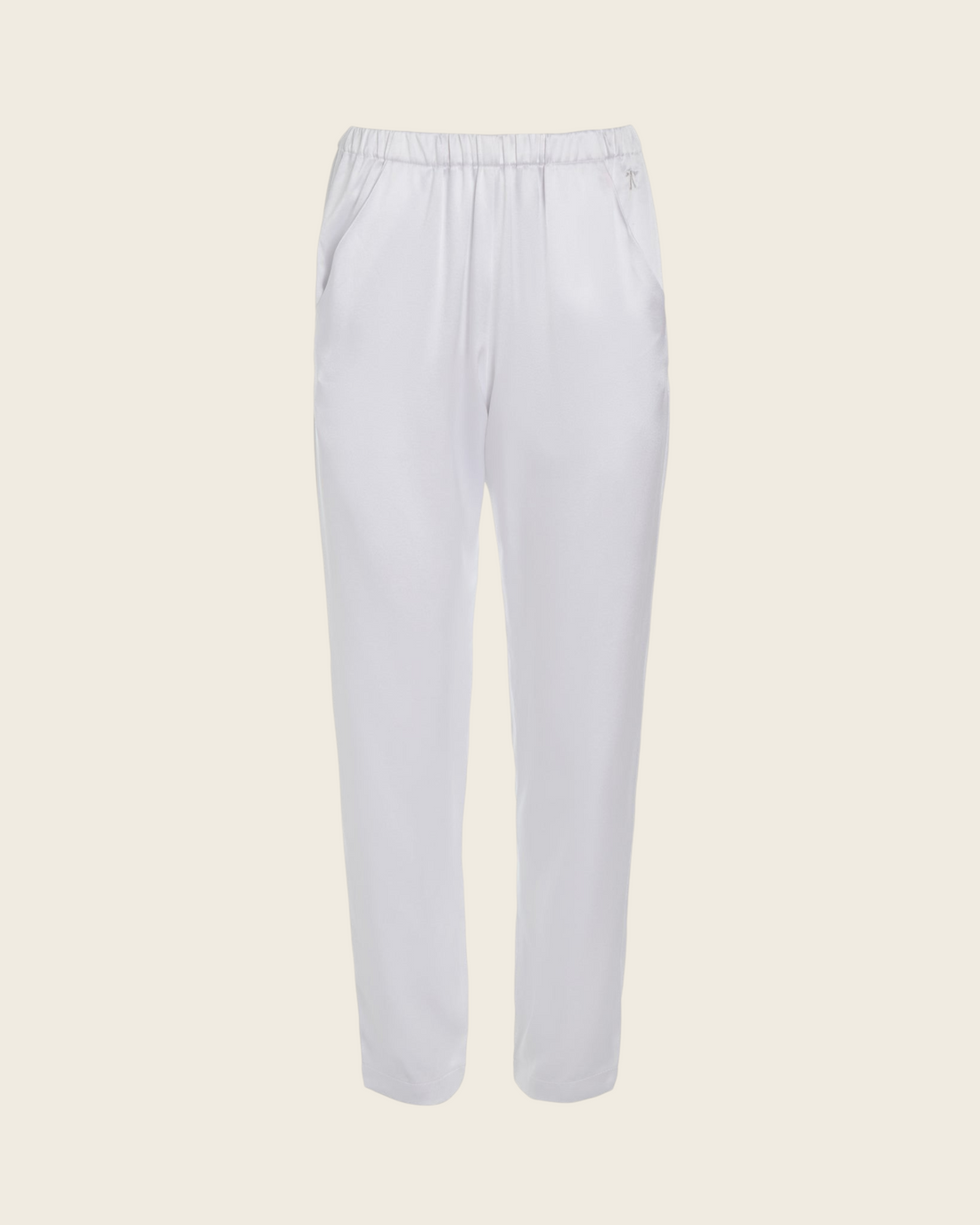 Weldun Rebecca Jogger in white mulberry silk with an elastic waistband, tapered leg, and side pockets.