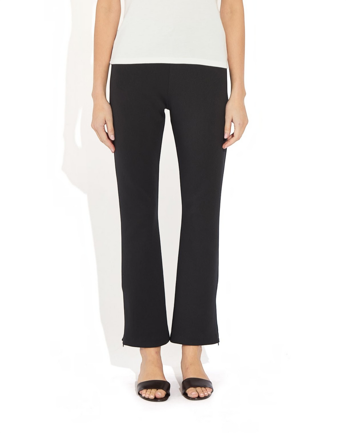 Weldun Sarah Pant in black recycled polyester with elastic waistband and adjustable side-zip hem for a flared fit.
