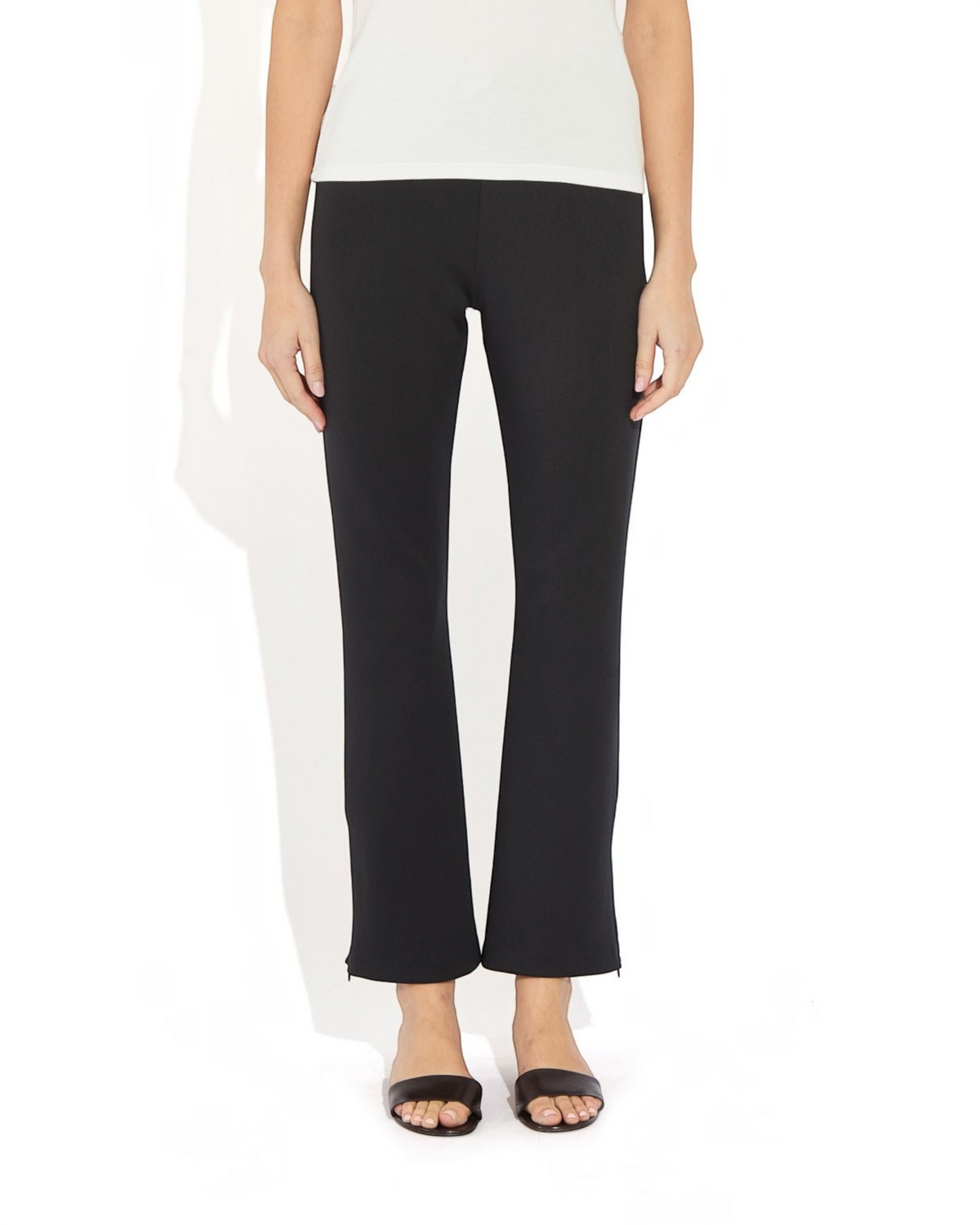Weldun Sarah Pant in black recycled polyester with elastic waistband and adjustable side-zip hem for a flared fit.