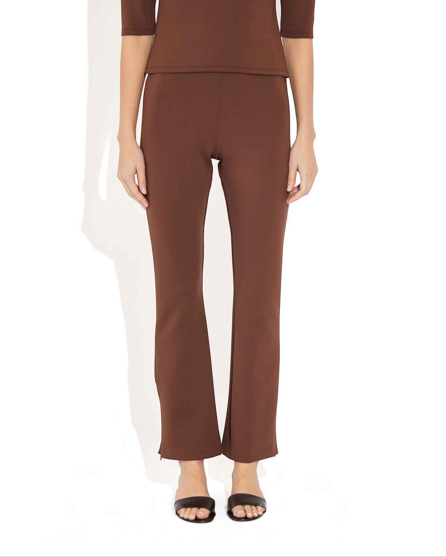 Weldun Sarah Pant in brown recycled polyester with an elastic waistband and adjustable side-zip hem detail.
