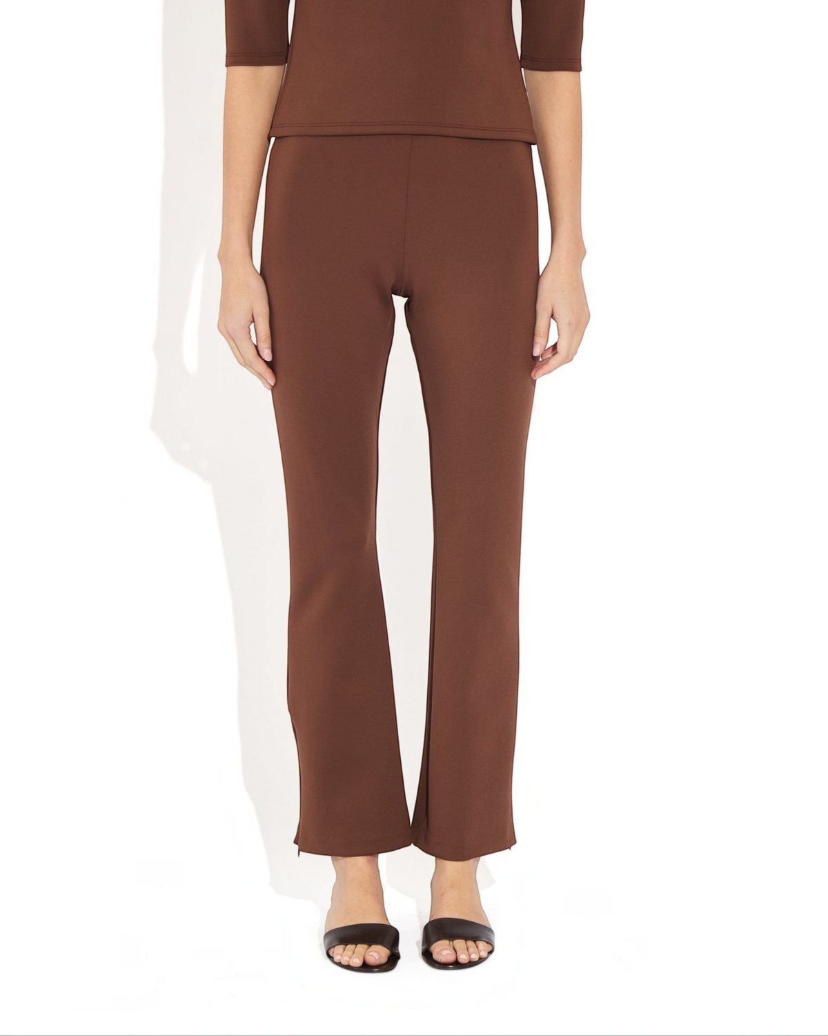 Weldun Sarah Pant in brown recycled polyester with an elastic waistband and adjustable side-zip hem detail.
