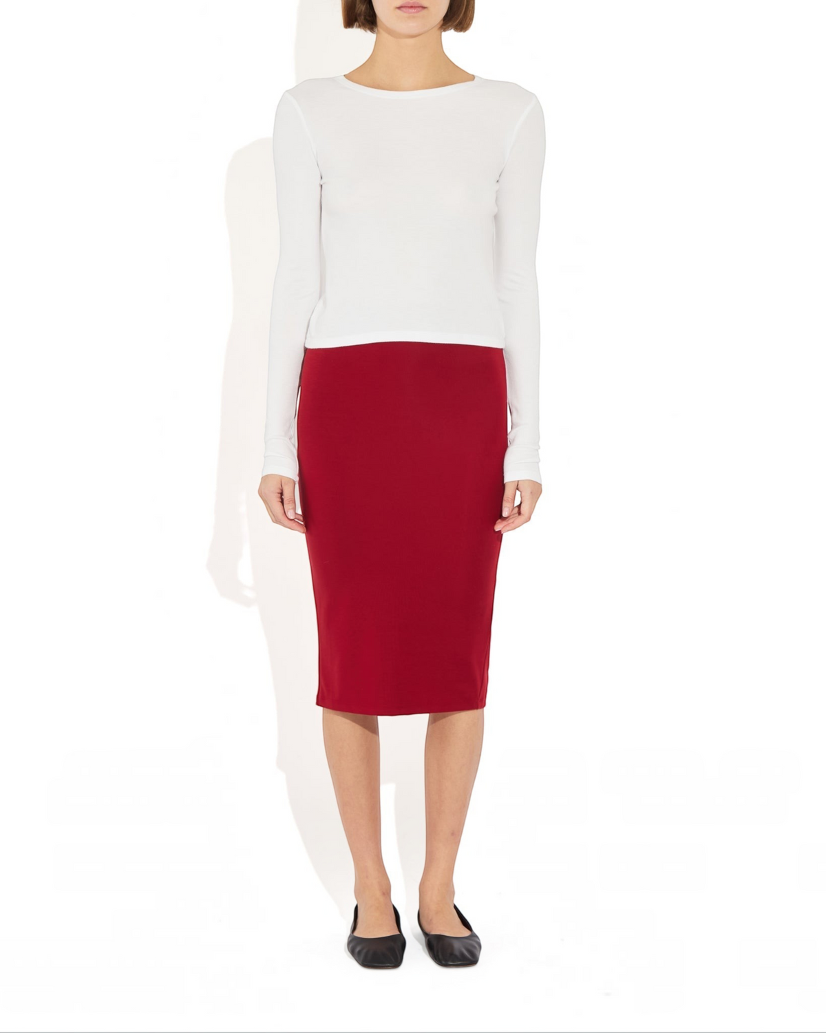 Weldun Sheryl Skirt in deep red, a soft MicroTencel pencil skirt with an elastic waistband and back slit