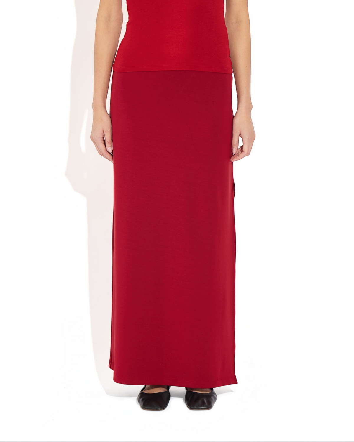 Weldun Ashley Skirt in deep red, a minimal pull-on column skirt made from soft stretch MicroTencel fabric.