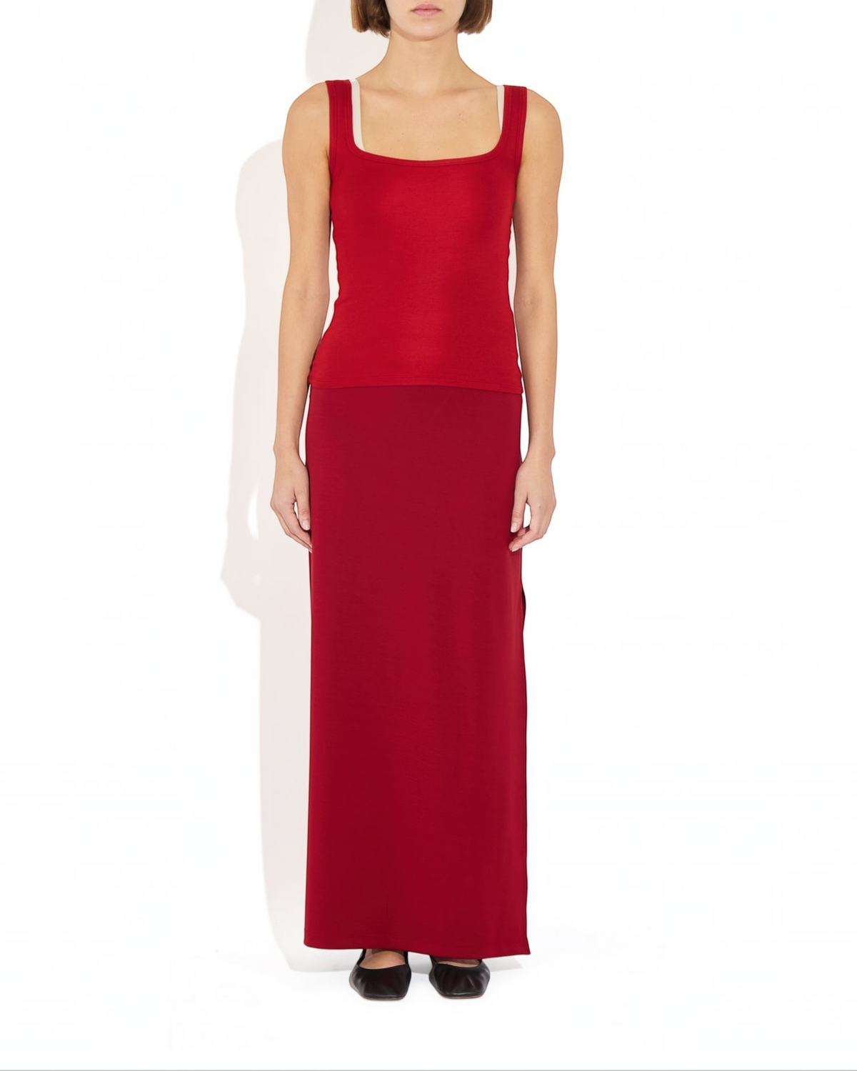 Weldun Ashley Skirt in red, a minimal column-silhouette pull-on skirt made from soft, breathable stretch fabric.