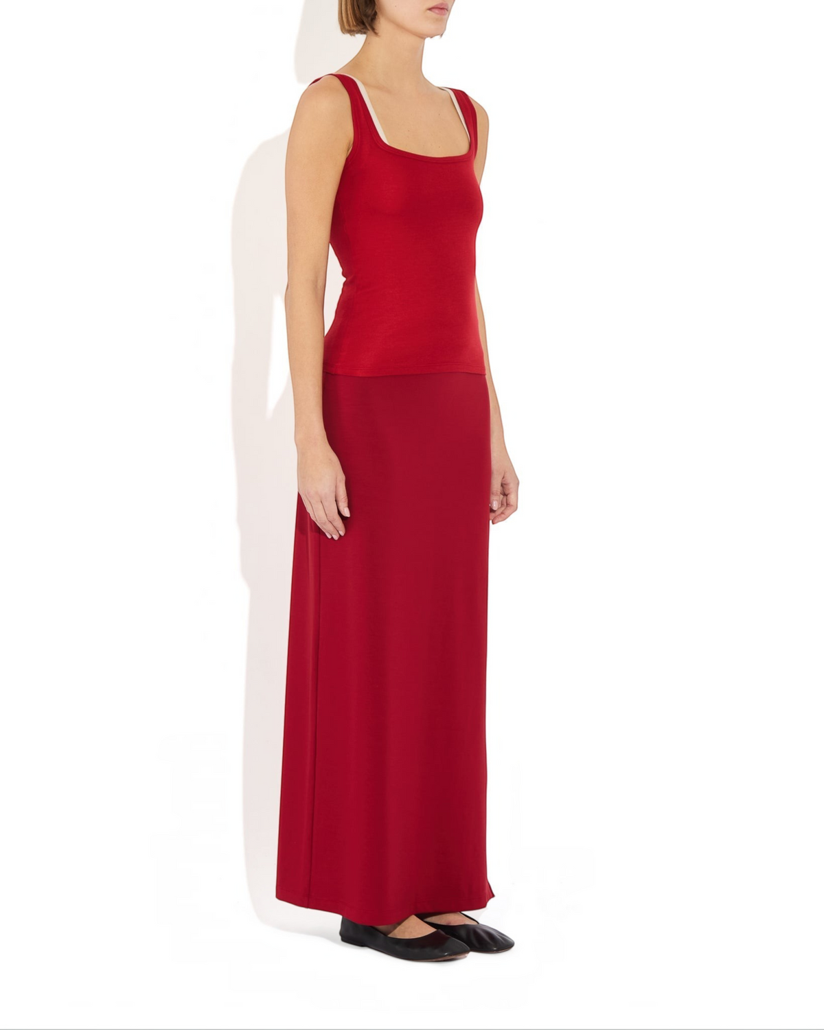 Weldun Ashley Skirt in red, a minimal column-style pull-on skirt made from soft, breathable stretch fabric.