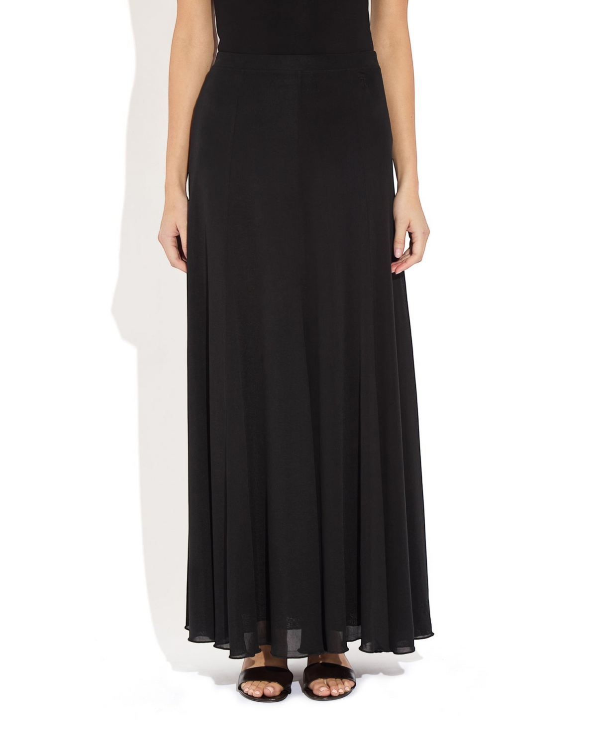 Weldun black semi-sheer Olivia maxi skirt in soft lyocell with an elastic waistband and fluid paneled construction.