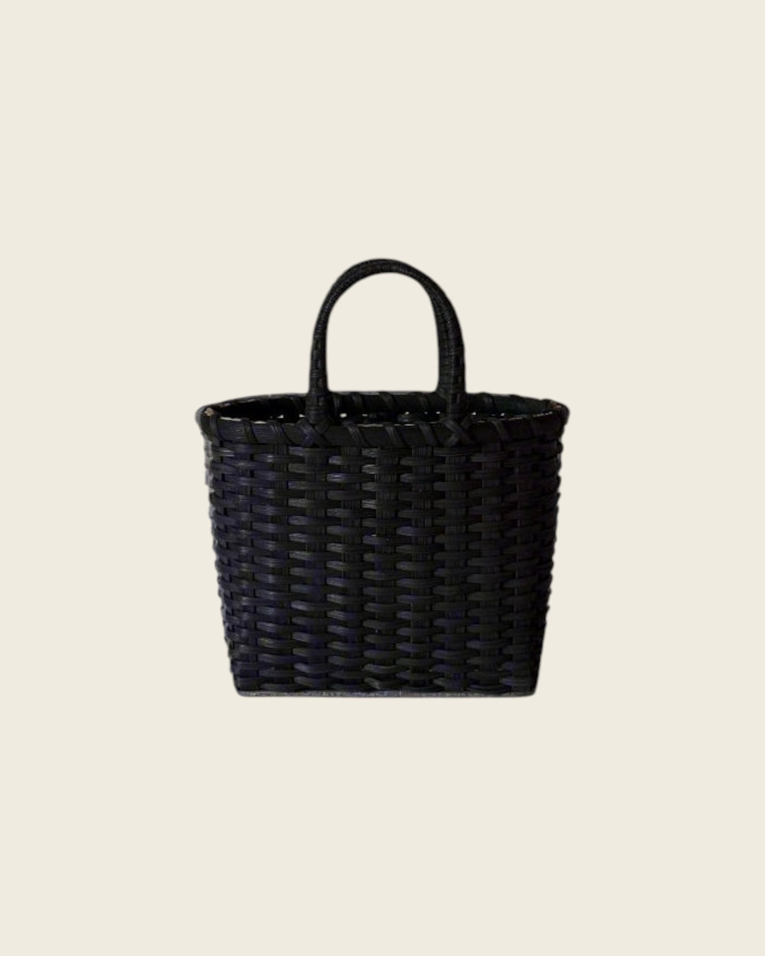Weldun Little Shopper hand-woven black rattan basket with wrapped handles on a neutral background