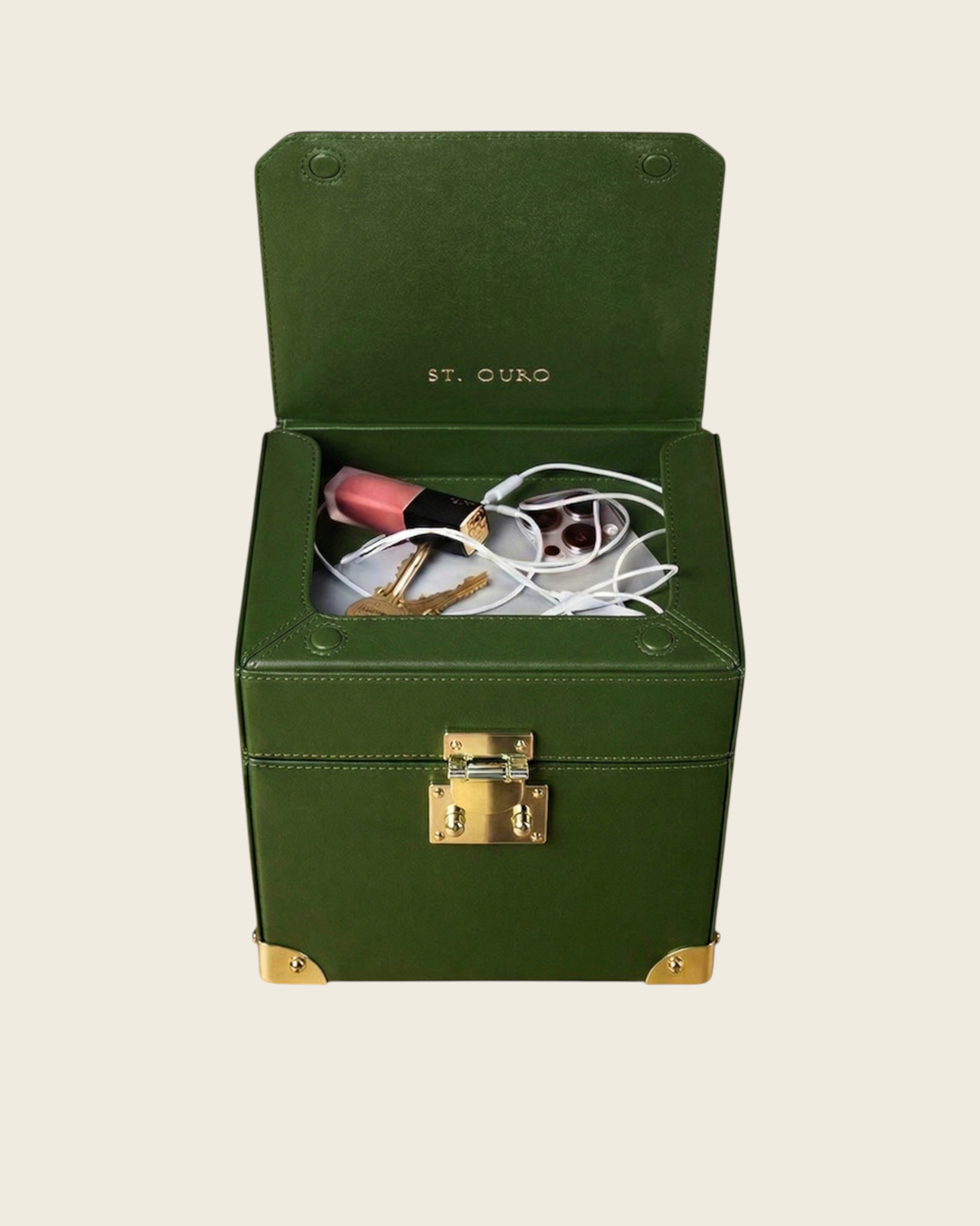 Weldun Themis breastmilk cooler in green nappa leather with gold hardware, showing the open top compartment.